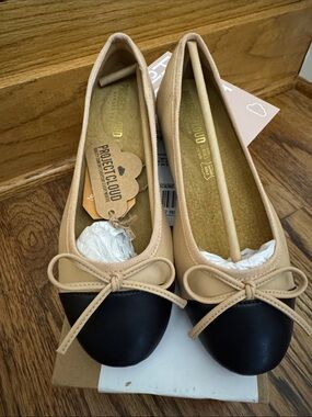 Two-Tone Beige and Black Ballet Flats